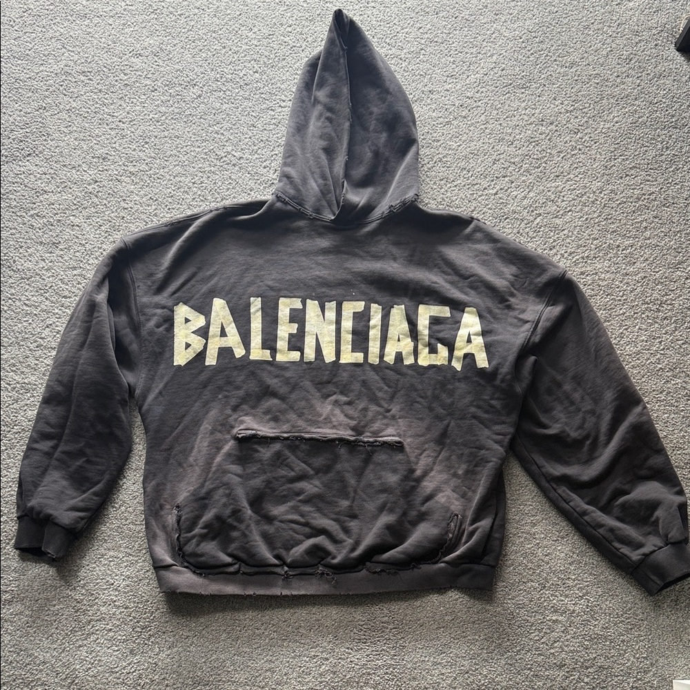 Balenciaga Distressed Black Hoodie with Contrasting Pale Logo